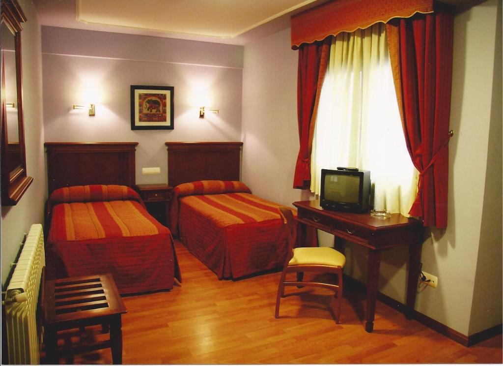 Hostal Torres Сан-Леонардо-де-Яґуе Номер фото